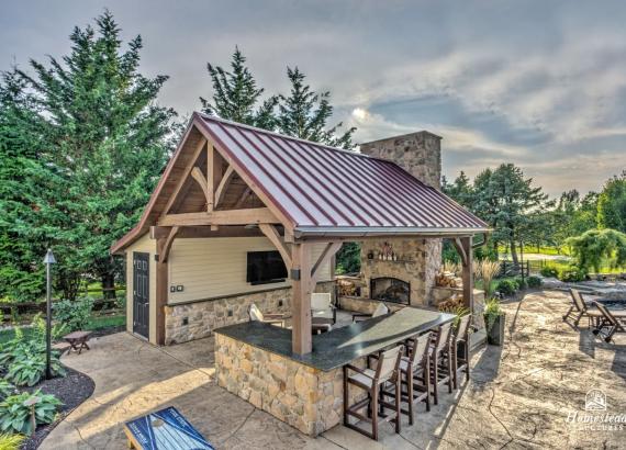 Photo of 16' x 20' Custom Timber Frame Pavilion with Double Sided Fireplace & Lean-To Shed in Orefield PA