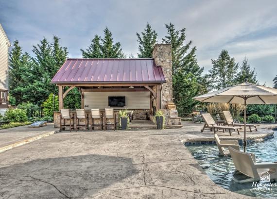 Photo of 16' x 20' Custom Timber Frame Pavilion with Double Sided Fireplace & Lean-To Shed in Orefield PA