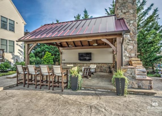 Photo of 16' x 20' Custom Timber Frame Pavilion with Double Sided Fireplace & Lean-To Shed in Orefield PA