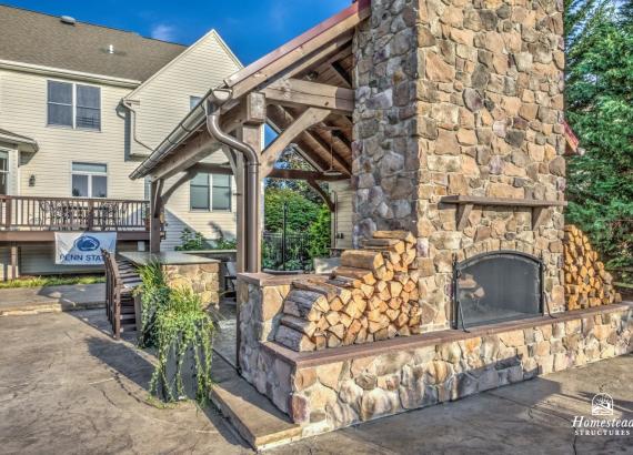 Photo of 16' x 20' Custom Timber Frame Pavilion with Double Sided Fireplace & Lean-To Shed in Orefield PA