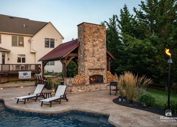 Photo of Wood-burning Fireplace on 16' x 20' Custom Timber Frame Pavilion with Double Sided Fireplace & Lean-To Shed in Orefield PA