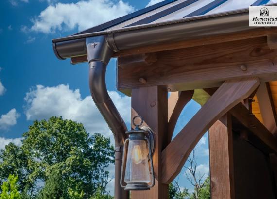 Gutters, rain spout and porch light on a 20' x 25' Timber Frame Pavilion with Fireplace & Outdoor Kitchen in Pennsburg PA