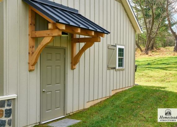 Photo of Timber and Metal Portico over Door to 25' x 24' Classic A-Frame Truss Garage in Chadds Ford PA