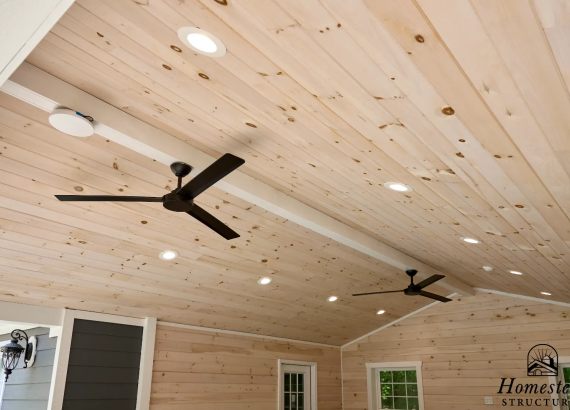 Wooden tongue-and-groove pine wall and ceiling finish, adding a rustic and warm look to the space